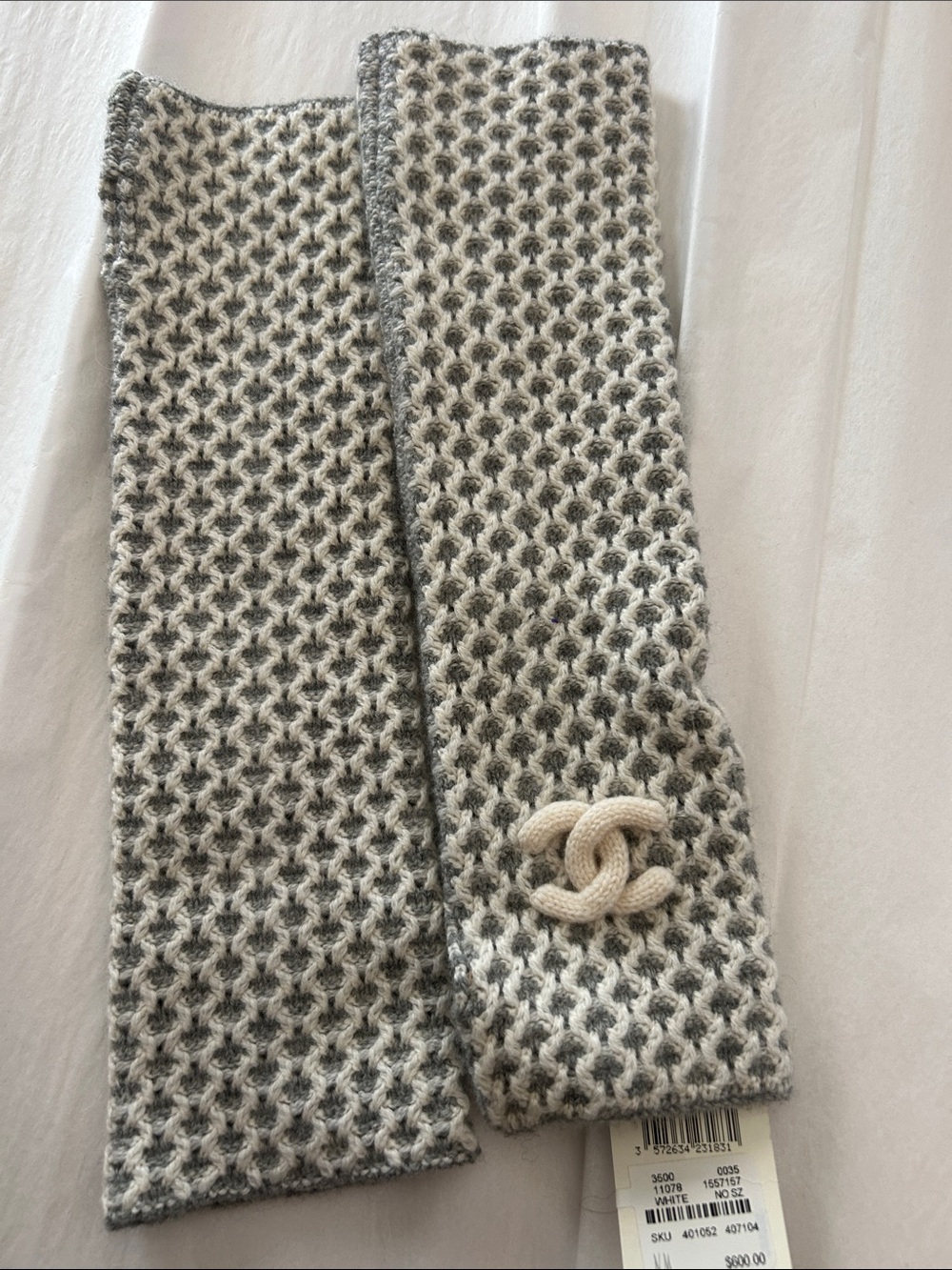 Brand new CHANEL fingerless Grey and Cream Knit gloves with CC Rope Emblem